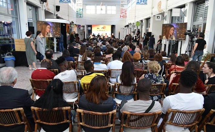 The crowd seated and listening to the guests at the SNF Dialogues event