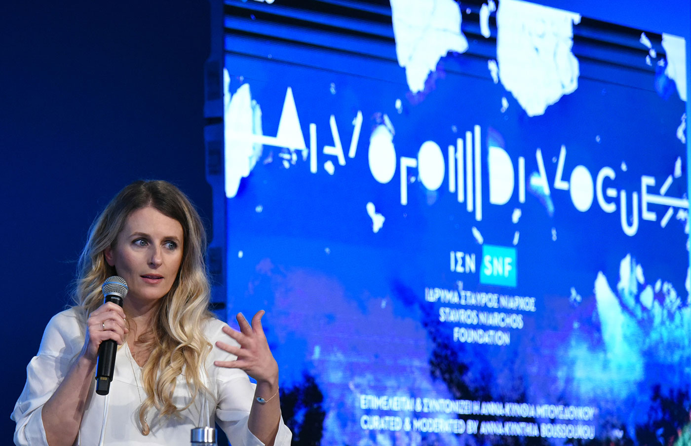 A woman speaking at the SNF Dialogues event