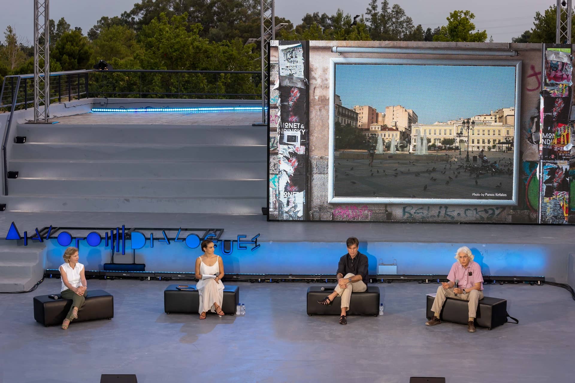 Anna Kynthia Bousdoukou and three guest speakers on stage at the SNF Dialogues event.