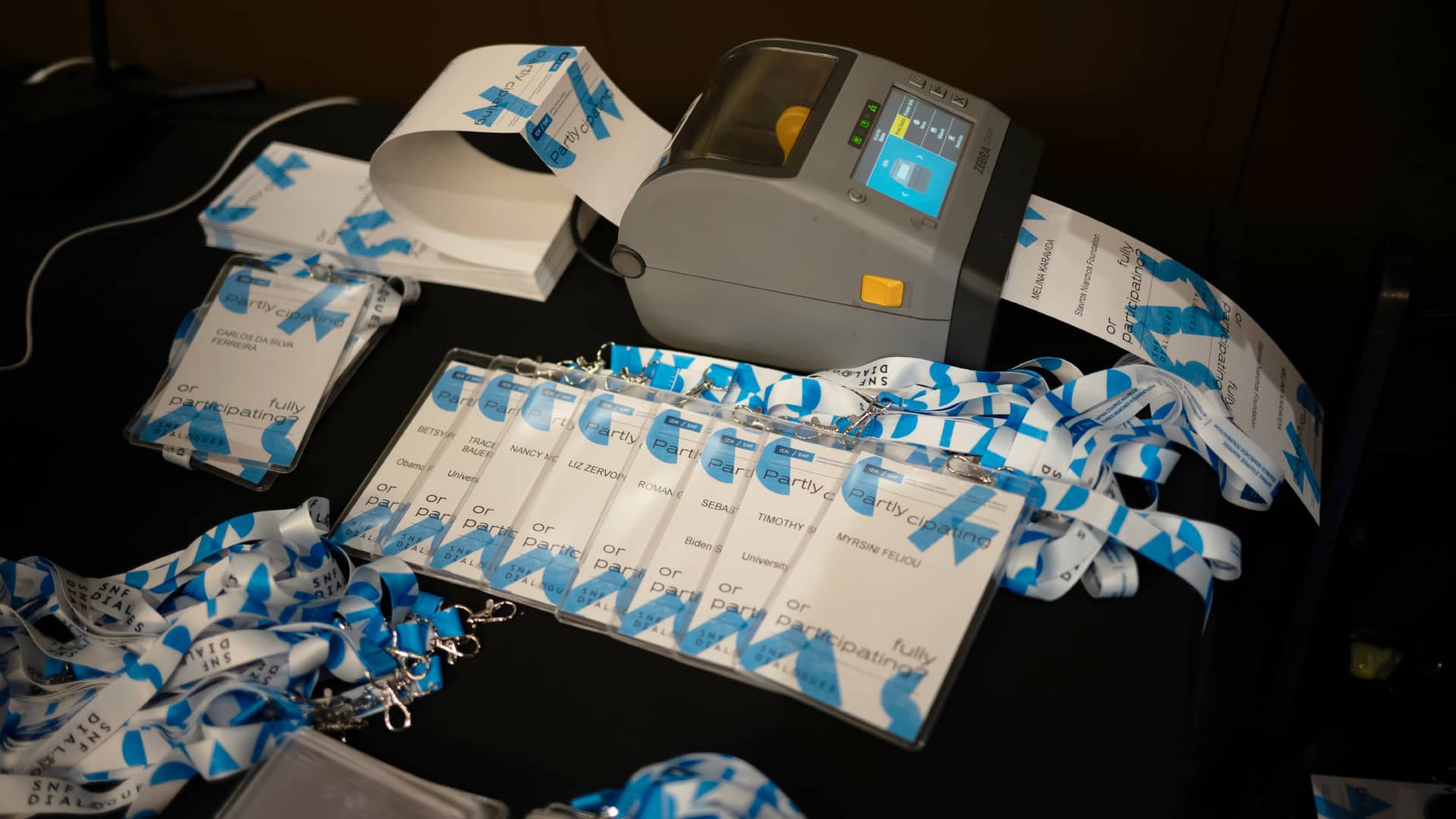 Device printing tickets for the SNF Dialogues event.