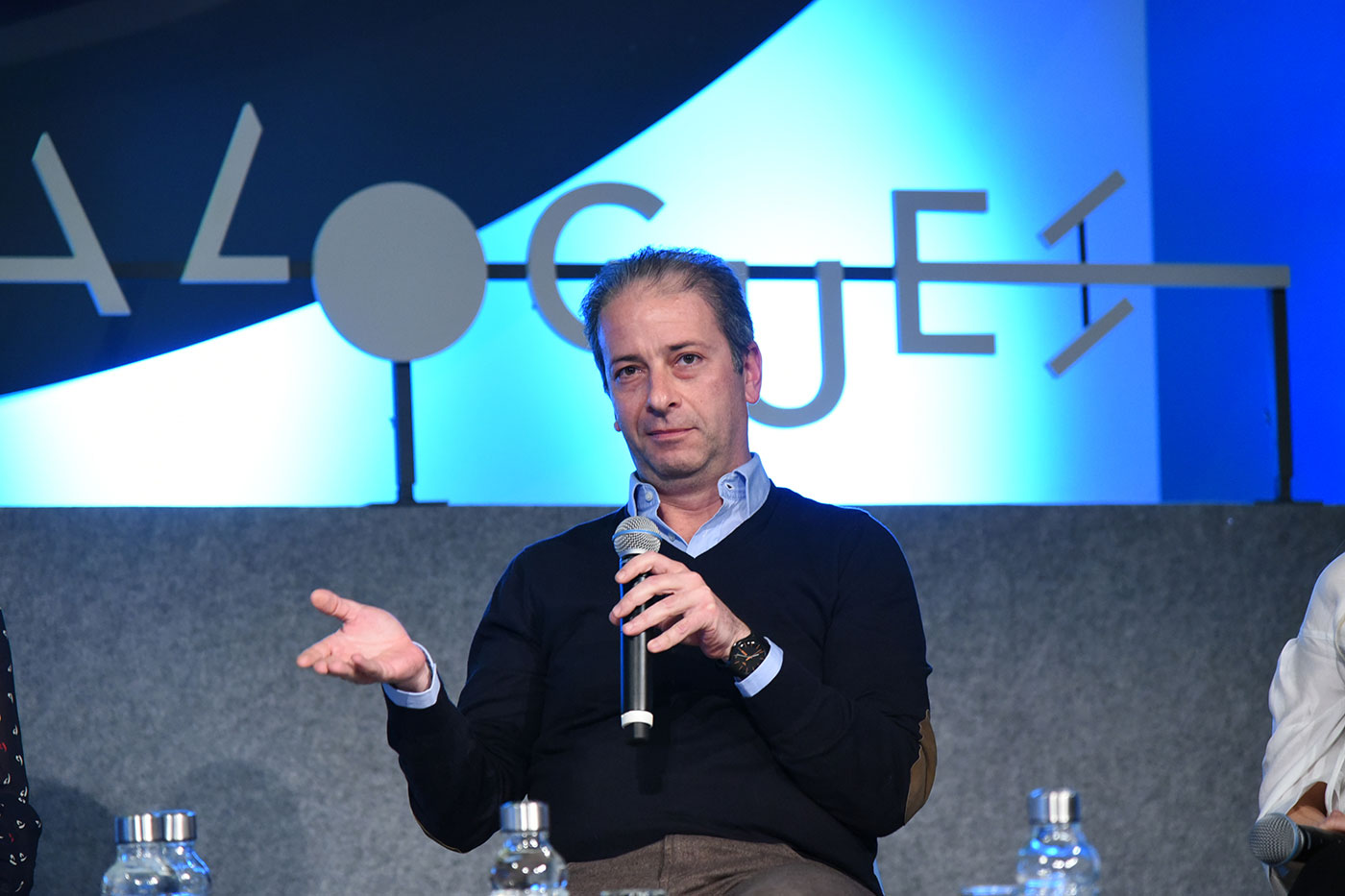 A man speaking at the SNF Dialogues event