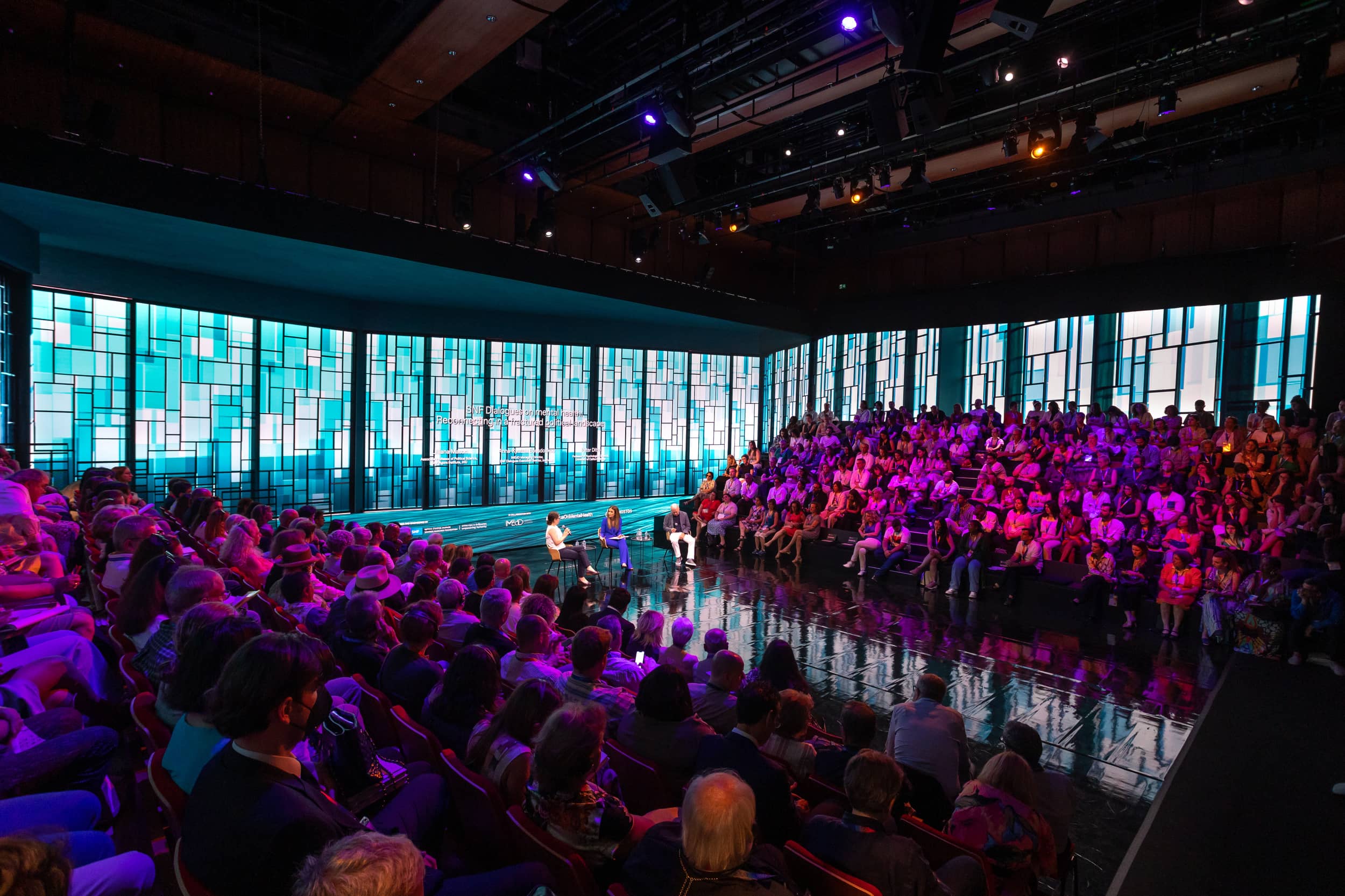 Audience and speakers at the SNF Dialogues event.