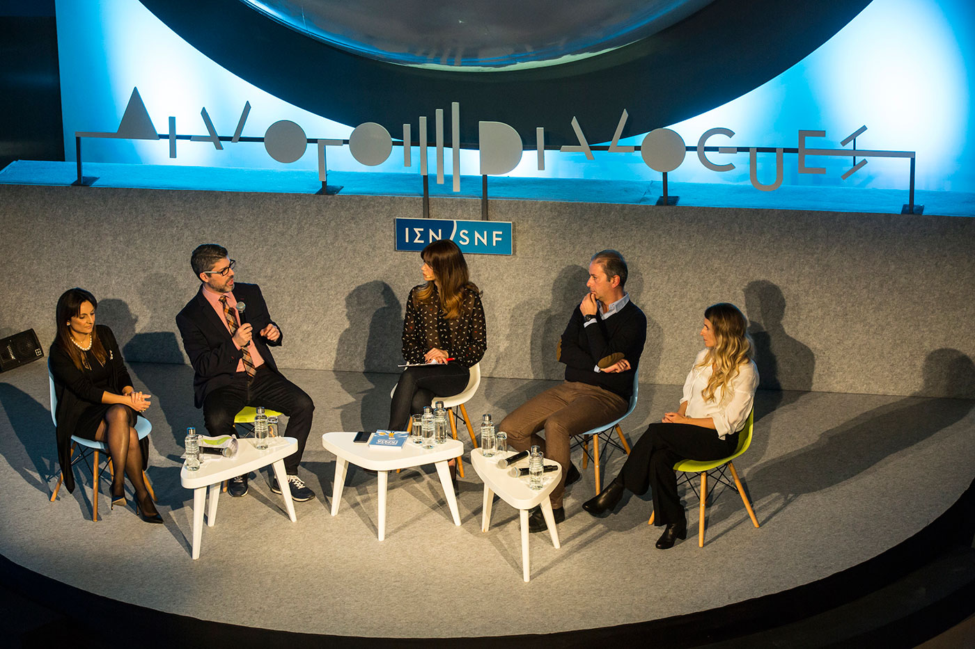 Anna-Kynthia Bousdoukou engaging in a conversation with the guests at the SNF Dialogues event