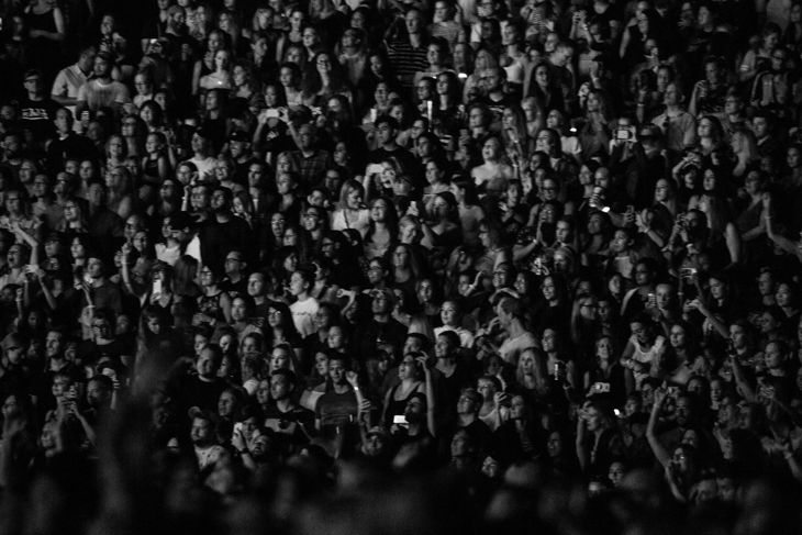 Α large crowd of people enjoying a concert.