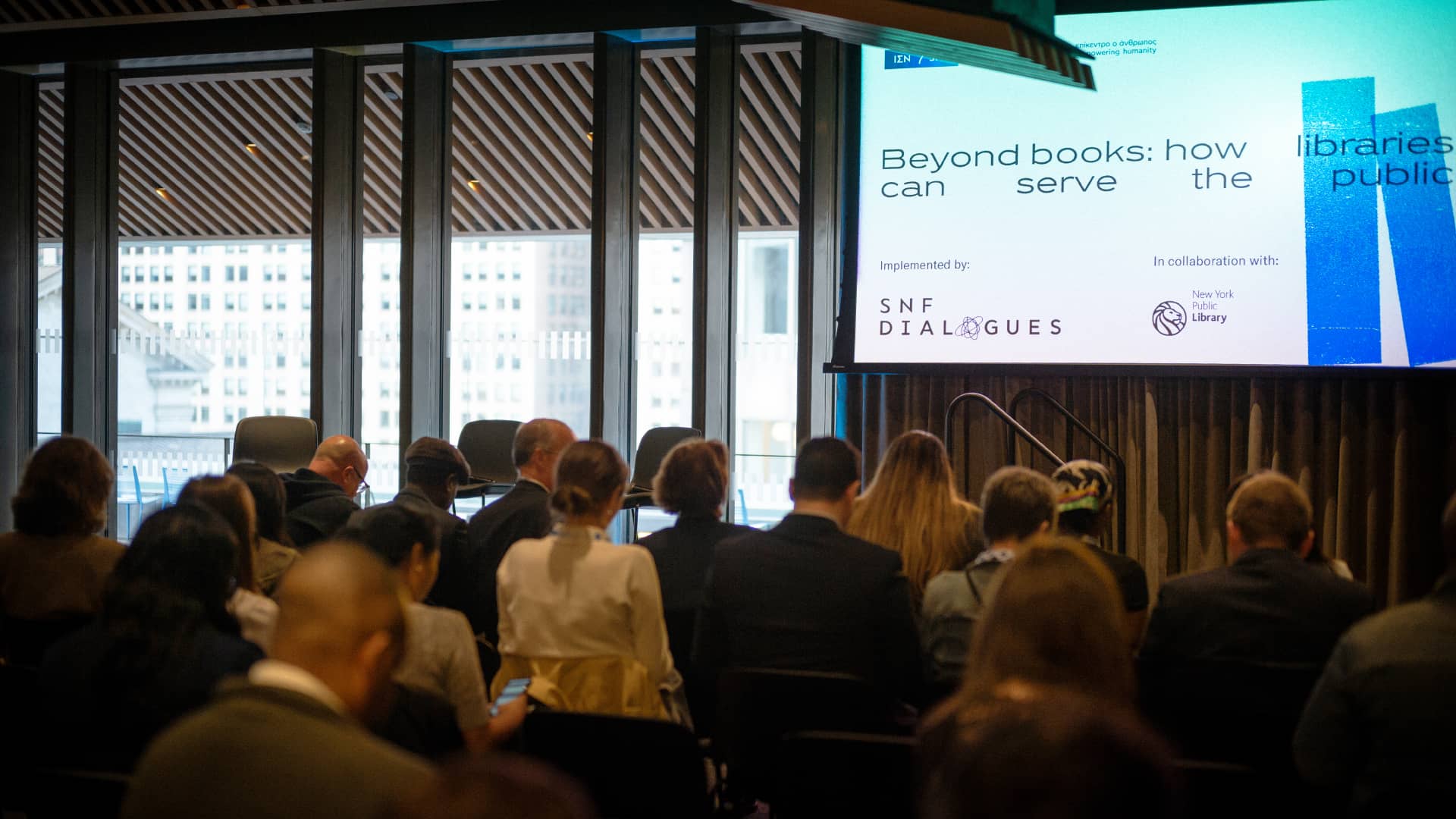Audience from the back watching a presentation at the SNF Dialogues event held at the SNFL in NY.