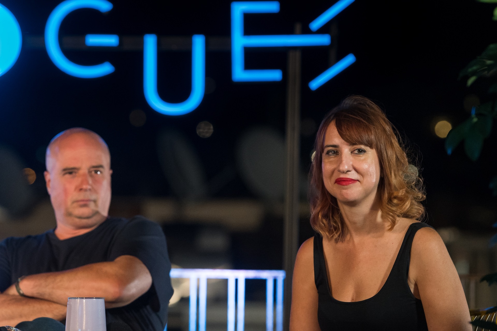 Co-president of SNF A. Drakopoulos and a woman speaker at the SNF Dialogues event.